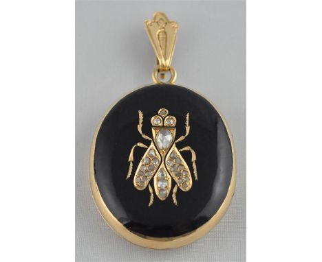 A fine Russian 14k. gold, black enamel and diamond mourning locket, 19th century, of ovoid form with gently convex side, the 