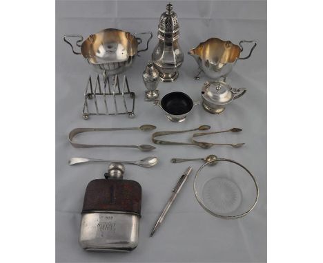 A collection of silver table ware, to include; An Edwardian&nbsp;silver, glass and brown leather hip&nbsp;flask, by Harrison 