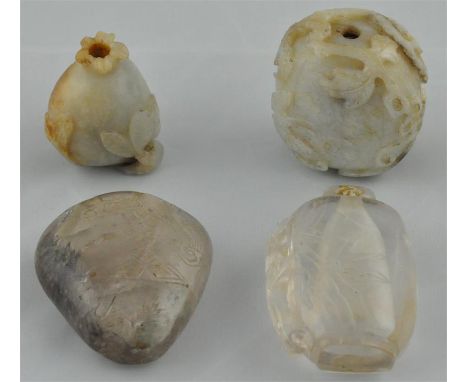 A finely carved 18th cent Jade snuff bottle, a 19th cent jade flower bud snuff bottle, together with two rock crystal snuff b