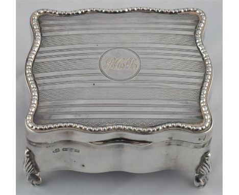 A silver jewellery box, by George Nathan &amp; Ridley Hayes, Chester 1913,&nbsp;with undulating sides, having engine turned d