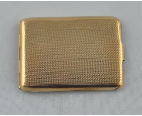 A 9ct gold match case, by William Neale &amp; Son Ltd., having engine turned decoration, 6cm. x 4.5cm. x 0.8cm. (26.3g)