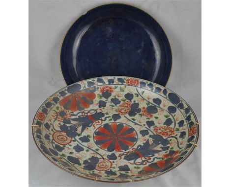 A Chinese Kangxi Imari charger, and a similar Chinese bowl with powder blue ground, Diameters 37cm and 28cm. (2)CONDITION; Th