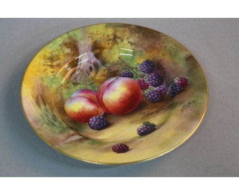 A ROYAL WORCESTER TEA PLATE HAND PAINTED WITH PLUMS AND BLACKBERRIES, signed by Horace Price, printed puce marks, date cypher