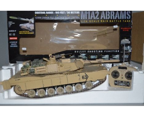 A BOXED MAPLIN RADIO CONTROL PLASTIC M1A2 ABRAMS MAIN BATTLE TANK, No.0817, 1:16 scale, not tested, missing bullets and targe