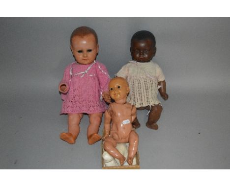 AN ARMAND MARSEILLE BISQUE HEAD BABY DOLL, nape of neck marked 'A.M. Germany 341/4.K', sleeping eyes, closed mouth, moulded h
