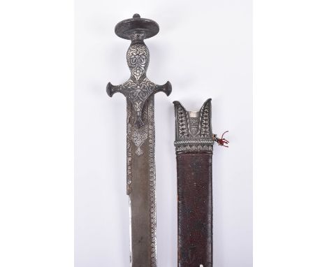 Indian Sword Kirach, 19th century, earlier single edge wootz blade silver damascened at the forte and with silver damascened 