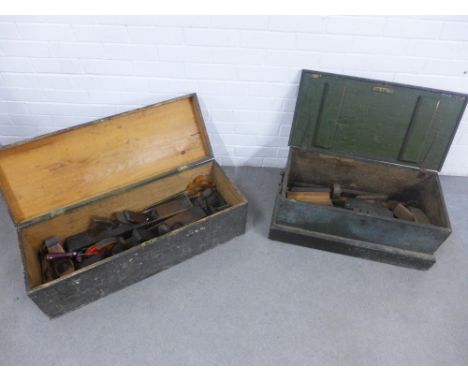 Two pine storage boxes / trunks containing a quantity of vintage tools to include wood working planes, hand drill, saws, etc 