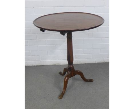 Mahogany tilt top table, the circular dished top on a baluster column with tripod legs, 58 x 71 x 58cm 