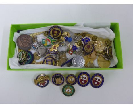 A collection of gilt metal and enamel badges together with some silver examples (a lot) 