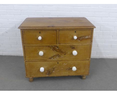Antique pine chest, the rectangular top with rounded edge over two short and two long drawers, with white ceramic bun handles