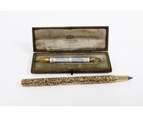 Gold and guilloche enamel propelling pencil, with roses pattern, stamped 9k, in original Elkington &amp; Co, Court Jewellers 