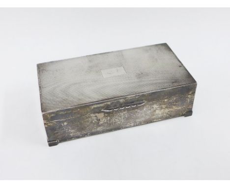 Silver table cigarette box, Birmingham 1958, engine turned decoration and hinged lid with cedar lined interior, 17.5cm long 