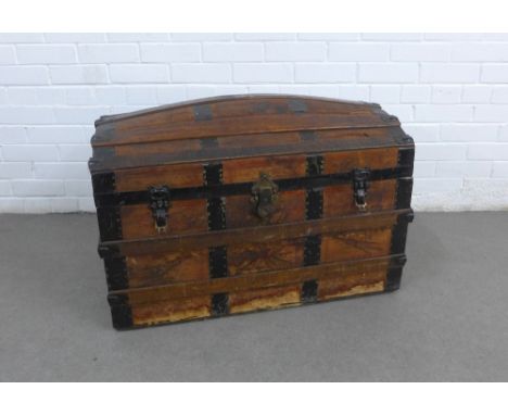 Dome top trunk with oak and metal bound leather outer covering with a lift out tray to the interior, 82 x 52 x 45cm 