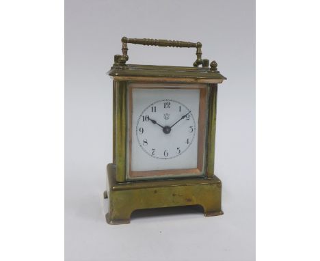 Small brass cased carriage clock with an alarm and bell, 12cm high including handle 