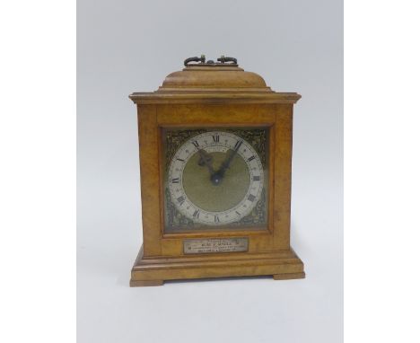 Walnut cased bracket style clock, with silvered chapter ring with Roman numerals, the brass dial inscribed John Dyson &amp; S