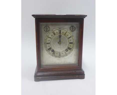 Mahogany cased mantle clock, the silvered dial with Roman numerals to the chapter ring and inscribed Mackay Chisholm, Edinbur