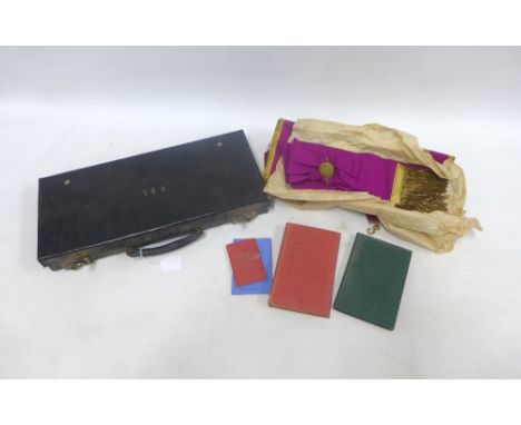 Masonic apron and sash with booklets and a black leather case 