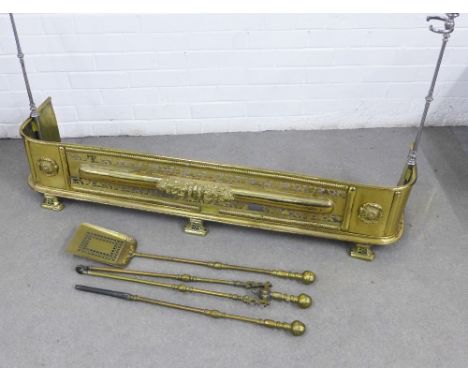 Brass fender with pierced design and flowerhead roundel,  together with fireside accessories, etc (a lot) 