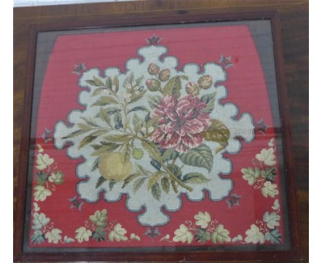 19th century tapestry panel of fruit and flowers,in a glazed frame, size overall 39 x 36cm 