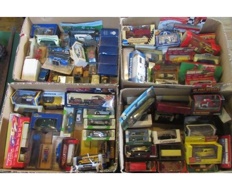 Four boxes containing a large quantity of model die-cast and other related toys, to include: Corgi, Mobil and other related t