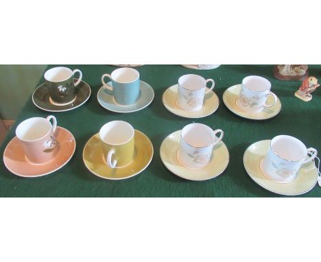 Four Susie Cooper coffee cans &amp; saucers, together with four Susie Cooper design coffee cans &amp; saucers.