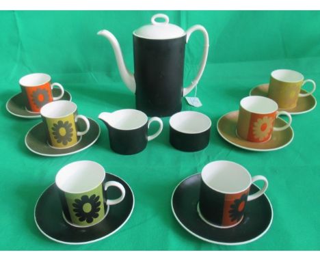 A Susie Cooper coffee service, Carnaby Daisy pattern, comprising: six coffee cans &amp; saucers, coffee pot, cream jug and su