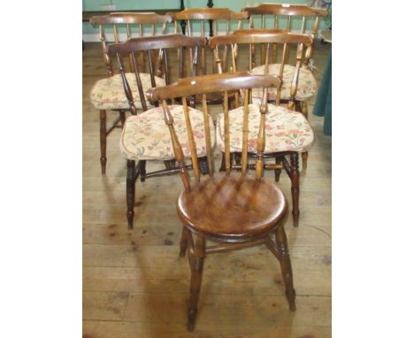 A set of six Hereford-style stick-back dining chairs.