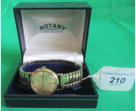 A gentleman's 9ct gold Rotary wristwatch with circular champagne dial, baton numerals and subsidiary seconds at 6 o'clock, to