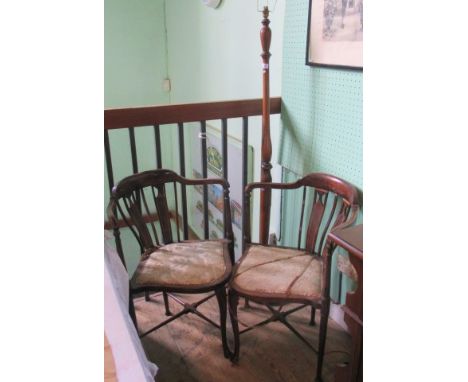 Two Edwardian inlaid corner chairs, together with an oak standard lamp.