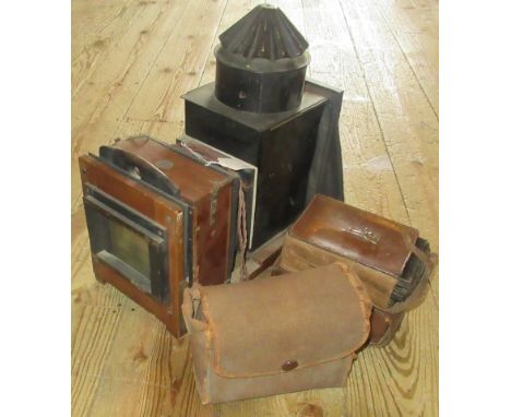 One box of miscellaneous photographic equipment, to include: magic lantern, cameras, plates, cases and other related items.