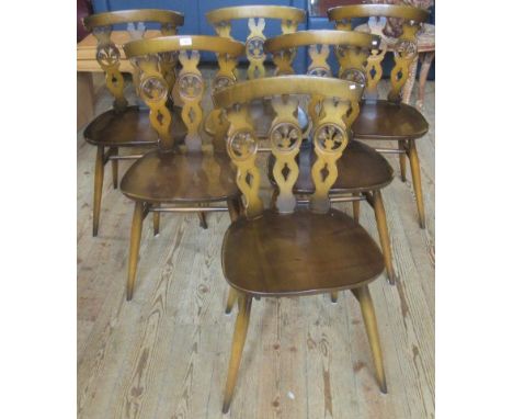 A set of six ercol dining chairs.
