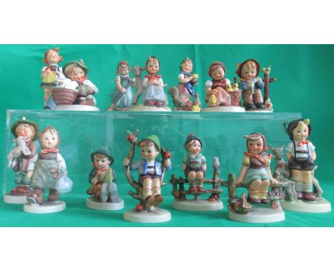 A collection of fourteen various Goebel figurines.