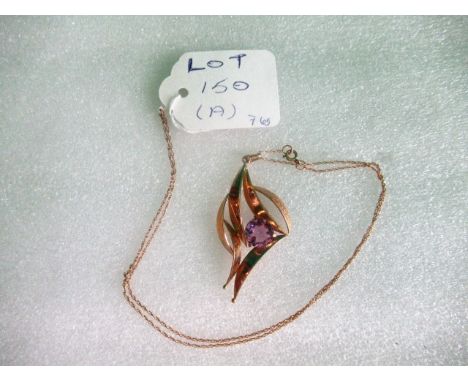 A 9ct gold and amethyst pendant of stylized open-work form, to a fine rope twist chain.