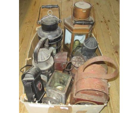 A box containing a quantity of miscellaneous lamps, to include: carriage lamps, roadwork lamp, two miners lamps and other rel