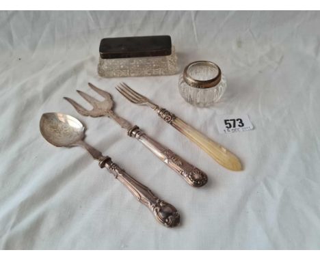 An oblong silver top jar and a silver handle bread fork etc.