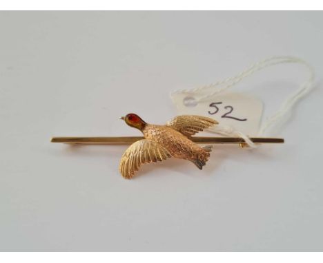 Antique Edwardian15ct grouse mounted on a 9ct bar brooch, enamel head 