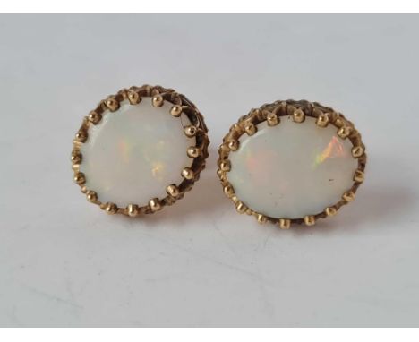 A pair of opal earrings 9ct 