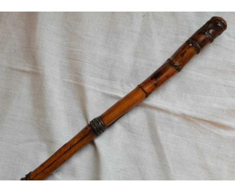 A bamboo cane sword stick 