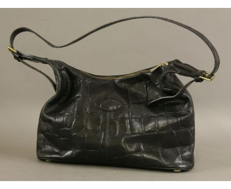 A Mulberry vintage black Congo leather handbag,classic design with embossed oval-shaped emblem to the front centre and zip ba