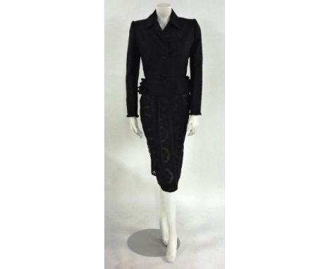 A Valentino black linen jacket,with button front and ruffle trim to hip line,size 6,a Valentino lace and black silk panelled 