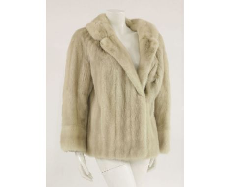 A vintage blonde mink fur jacket, with three-quarter length sleeves and silk lining