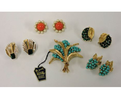 A Trifari spray brooch and earring suite, c.1955-1965,with original swing ticket stating 'Advertised in Vogue', with textured