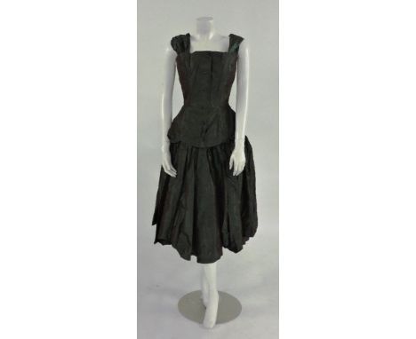 A green shot silk taffeta bodice and full skirt,c.1950, reputedly made by Balmain, the bodice with button front and gathered 