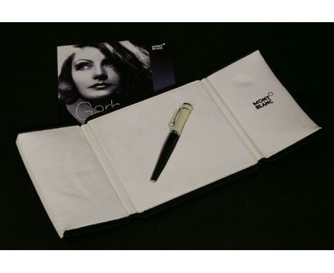 A Montblanc Greta Garbo Special Edition fountain pen,36120, with black resin barrel and cream resin cap, a platinum plated cl
