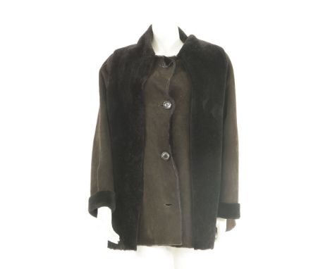 A Nicole Farhi brown sheepskin jacket,c.2010, with integral scarf design and turn-up cuff, size 14
