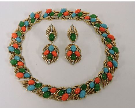 A Trifari necklace and earring suite, c.1955-1965,in original Trifari case, the necklace composed of trefoil clusters of oval