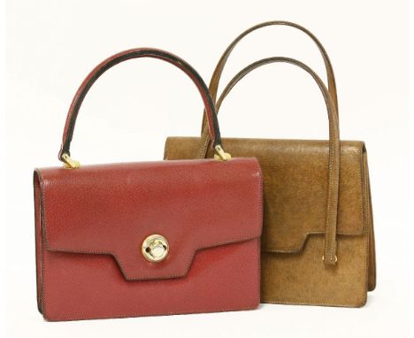 A Gucci vintage red leather handbag,with gold-tone clasp and hard handle,a Gucci vintage brown leather handbag,with gold-tone