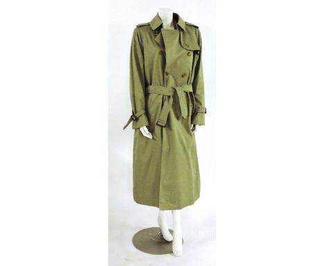 A Burberry camel-coloured double-breasted trench coat,classic fit, in a weatherproof cotton gaberdine lined in a 'Haymarket' 