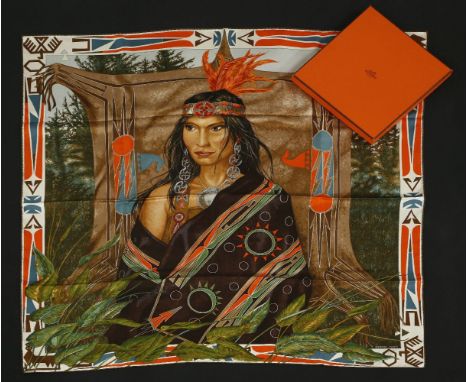 An Hermès silk scarf,'Wa 'Ko-Ni', olive-brown printed with an image of a North American Indian woman, with box,90 x 90cm