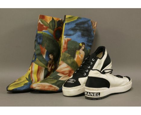 A pair of Chanel black and white trainers,with 'CC' logo to front, size 38, anda pair of Charles Jourdan vintage canvas boots